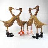 Two pairs of wooden ducks