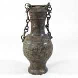 A bronze archaic style vessel
