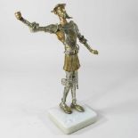 A silvered figure of a Spanish soldier