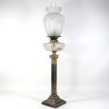 An 19th century silver plated oil lamp