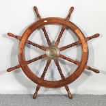 A wooden ship's wheel