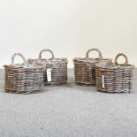 A set of four wicker baskets