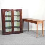 A walnut side table with a single drawer