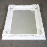 A white painted wall mirror