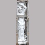 A pair of life sized carved marble columns