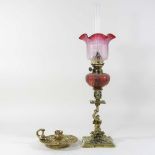 A 19th century brass oil lamp