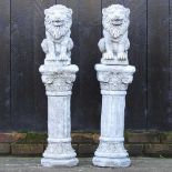 A pair of reconstituted stone lions