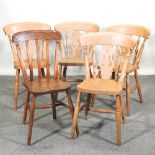 A set of four beech dining chairs