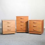 A pair of teak effect bedside chests