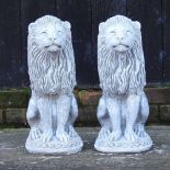 A pair of reconstituted stone lions