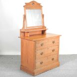 An Edwardian satin walnut dressing chest