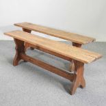 A pair of Arts and Crafts pine benches