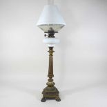 A 19th century gilt oil lamp