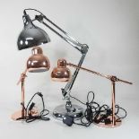 A pair of copper adjustable lamps