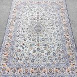 A Persian woollen carpet