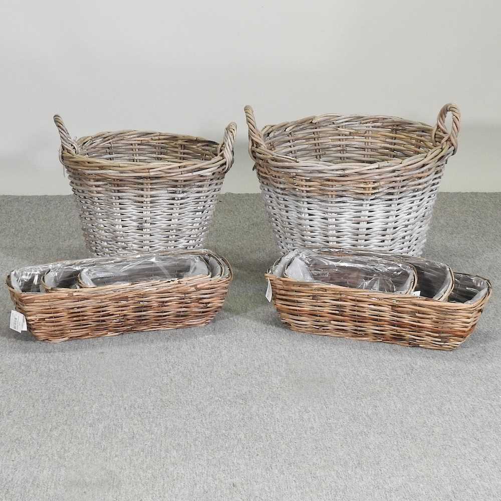 Three wicker planters