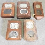 A collection of wall clocks