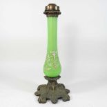 A 19th century green glass candle lamp base