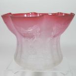 A red glass oil lamp shade