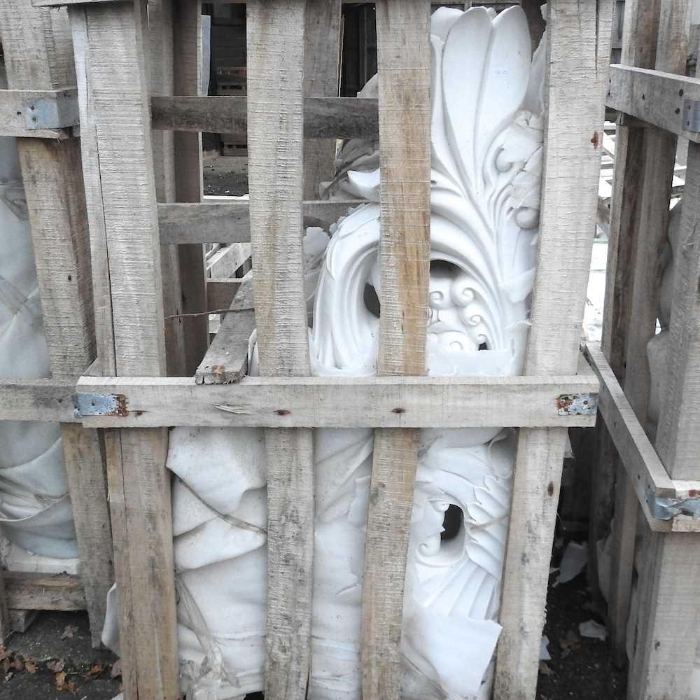 A pair of marble architectural brackets