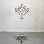 A black painted iron candelabra