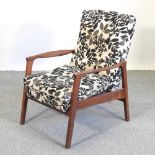 A 1960's teak armchair