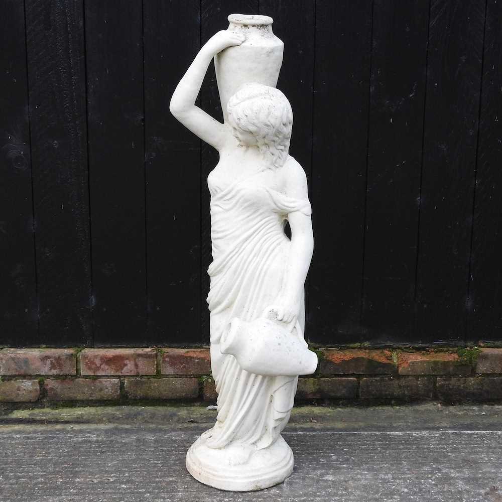 A cast stone garden figure