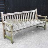 A hardwood slatted garden bench