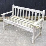 A hardwood slatted garden bench