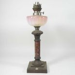 A 19th century bronzed oil lamp base