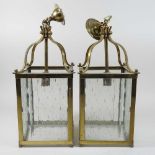 A pair of brass hanging lanterns