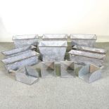 A set of four zinc planters