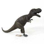 A bronze model of a dinosaur