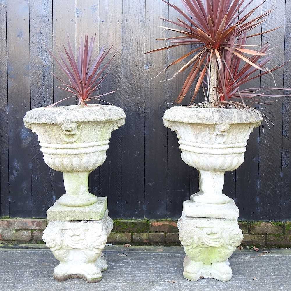 DAY TWO - A pair of cast stone garden urns