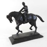 A bronze figure group of a mounted jockey