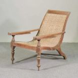 A teak plantation chair