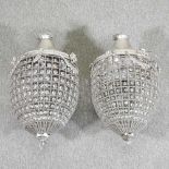 A pair of chandeliers