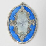A continental white metal and enamel pendant