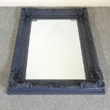 A painted wall mirror