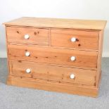 An antique pine chest of drawers