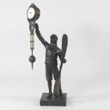 A figural mystery clock