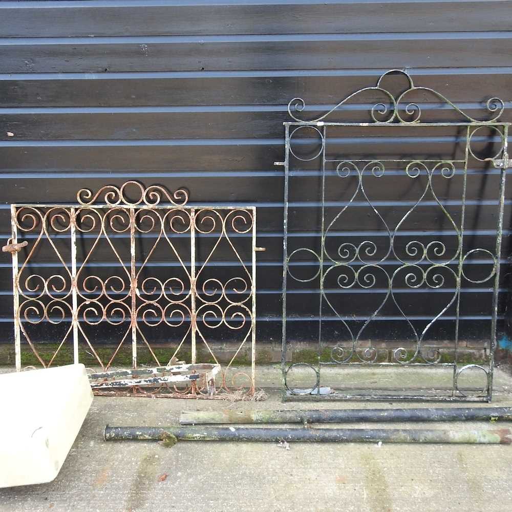 A wrought iron garden gate