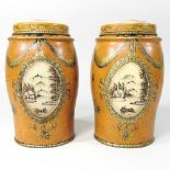 A pair of tole style canisters