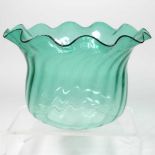 A green glass oil lamp shade