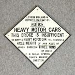 A cast iron railway sign