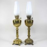 A pair of brass oil lamps