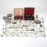 A collection of silver and plated items