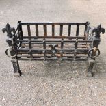 A wrought iron fire grate