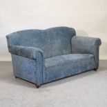 An early 20th century blue upholstered sofa