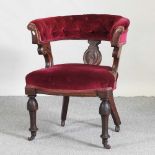 A Victorian red upholstered desk chair